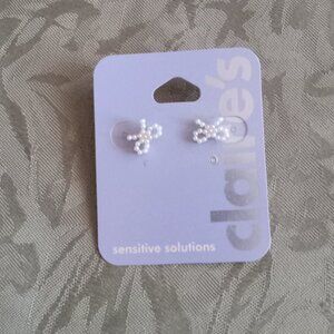 Claire's sensitive solutions pearl-like bow tie earrings never worn